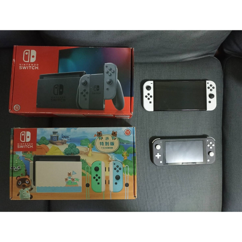 Switch OLED單主機+白色Joy Con(附綁帶)+原廠電源器+收納包